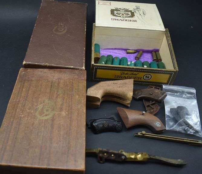 Pistol Grips, Bullet Mold, Assorted Shells and 2 Colt Boxes BHD Auctions