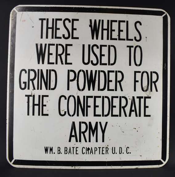 Painted Metal Sign "These Wheels Were Used to Grind Powder For the