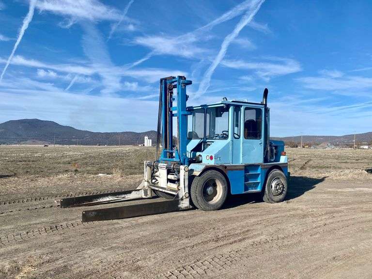 1991 Roadrunner Hay Squeeze Booker Auction Company