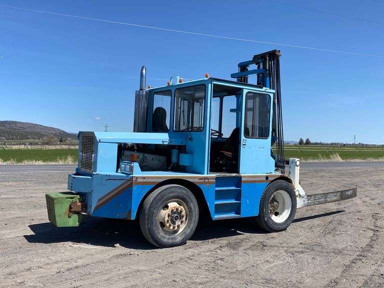1991 Roadrunner Hay Squeeze Booker Auction Company