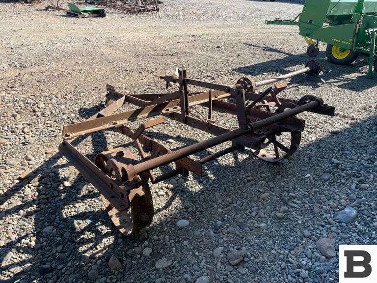 Antique Cultivator Booker Auction Company