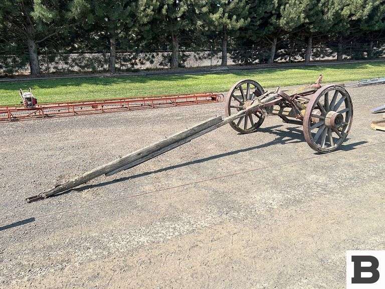 Antique Wagon Tongue and Front Axle Booker Auction Company