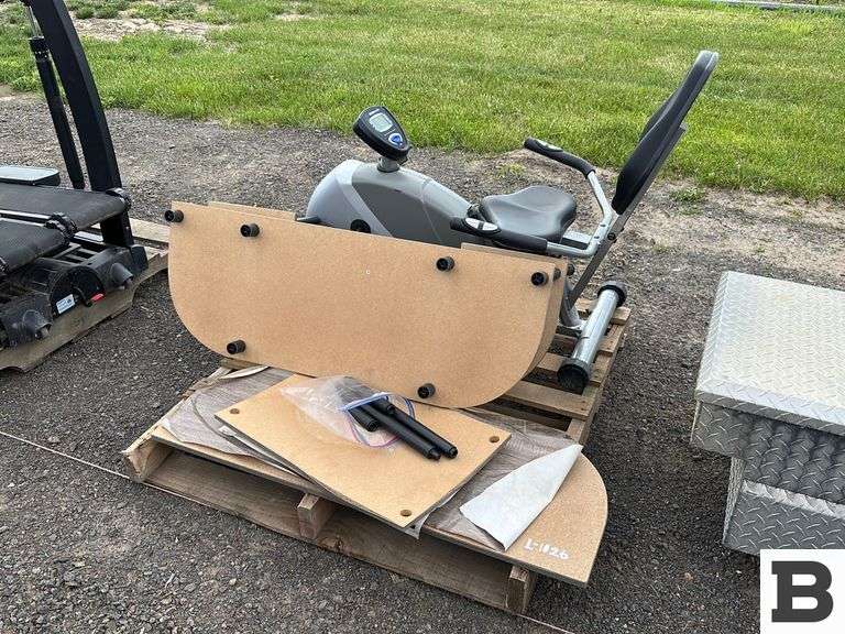 Recumbent Exercise Bike & Table Booker Auction Company