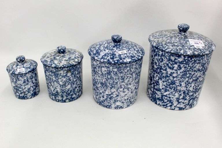 Ceramic Canister set made in Italy with a blue splatterware glaze. Four