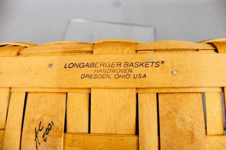 Collection of Longaberger baskets, includes a hexagon shaped basket