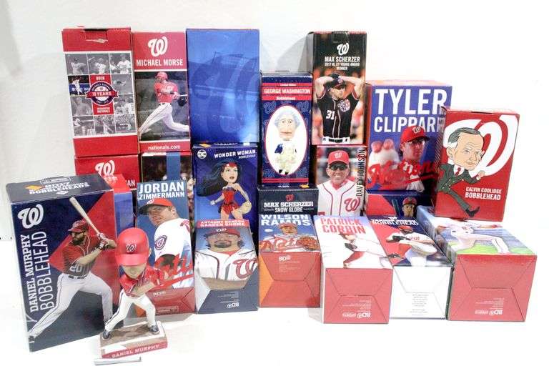 Collection of Bobbleheads sports and other Bunting Online Auctions