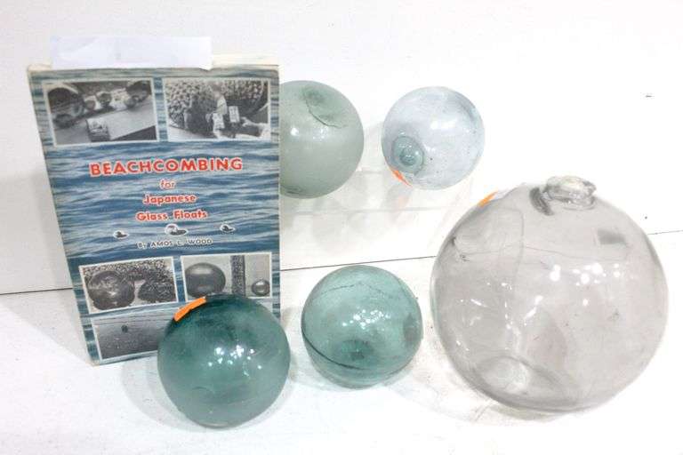 Japanese glass floats and book, six items. Description courtesy of the