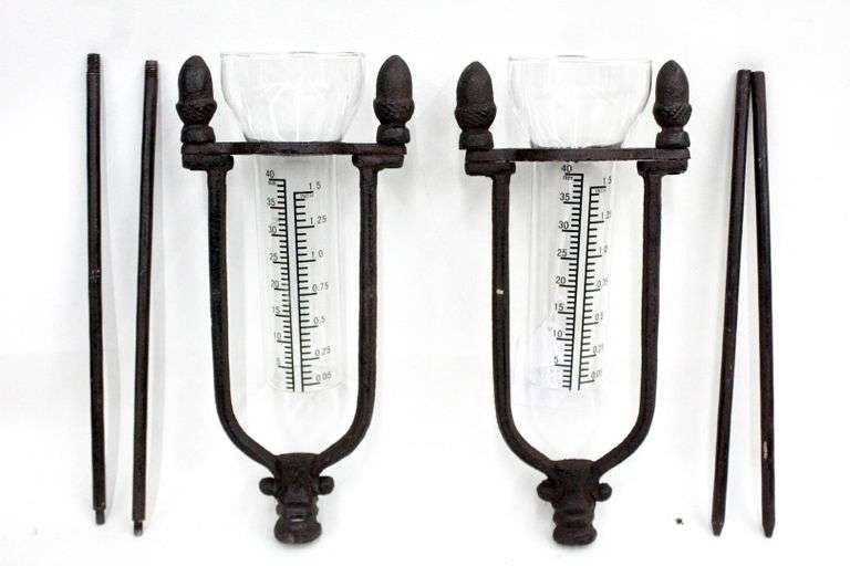 Glass Rain Gauge with a wrought metal decorative stand. Bunting