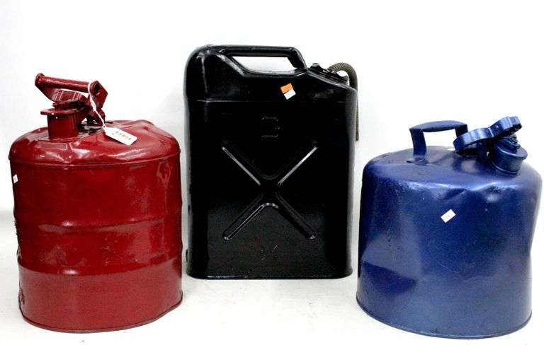 Vintage 5 gallon Gas Cans painted blue, red and black. Black one is