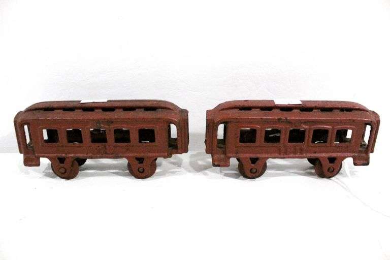 Vintage cast iron toy train passenger cars, two items. Bunting Online