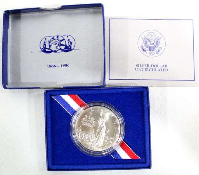 1986 US Liberty Silver Coin , Uncirculated , Ellis Island dollar Bunting Online Auctions
