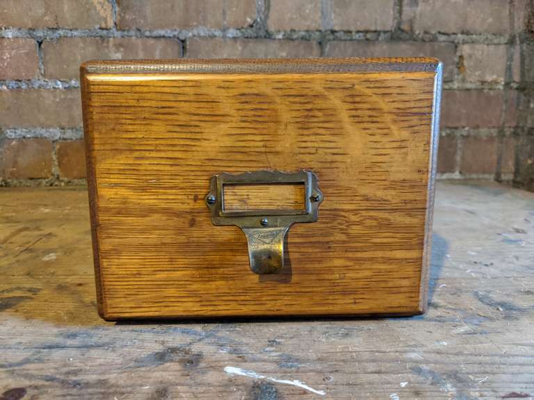 Small oak file card catalog box Bid On Estates Auction Services