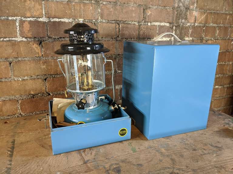sears camping lantern in blue case Bid On Estates Auction Services