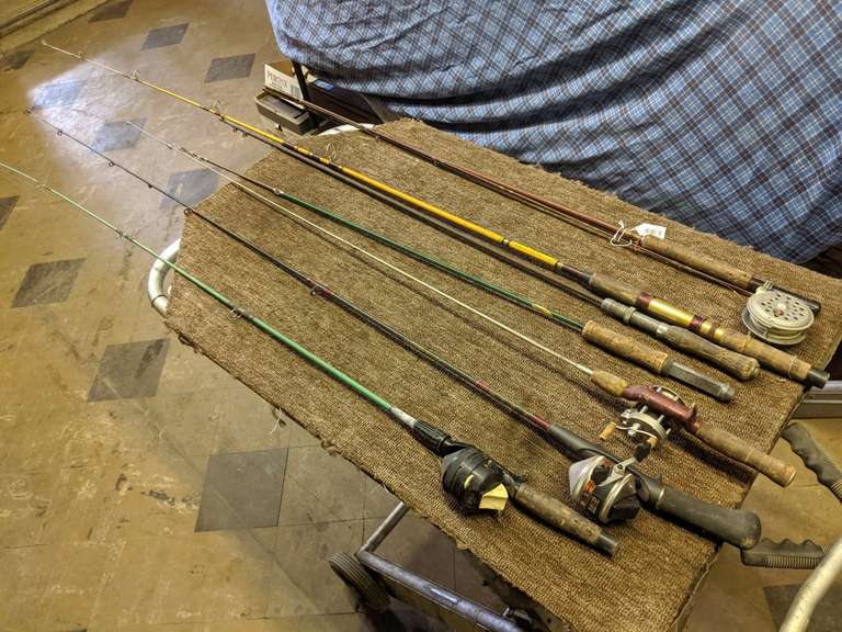 Group of Vintage Fishing Rods Bid On Estates Auction Services