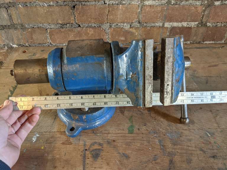 blue bench vise, rotating head Bid On Estates Auction Services