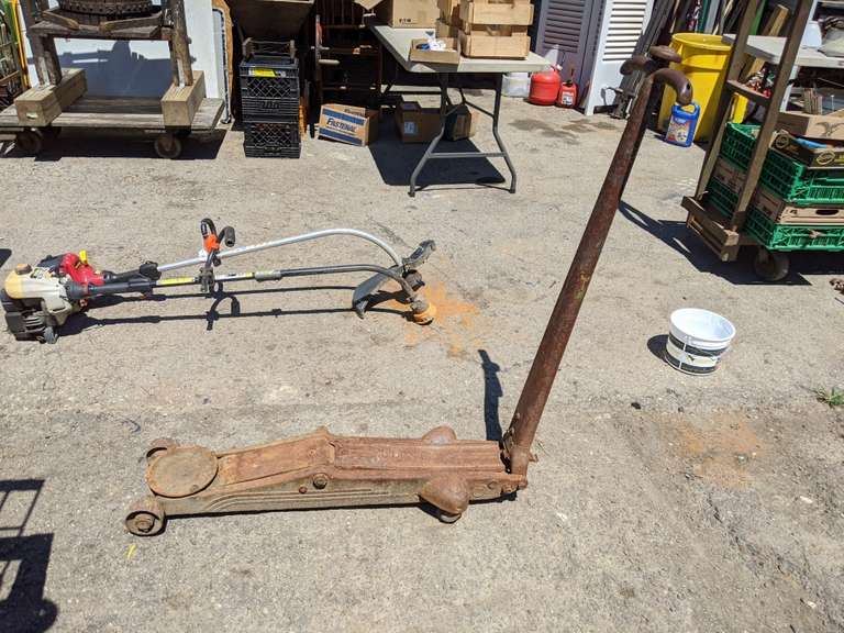 Antique Floor Jack (almost 4') pumps a little, but does not hold