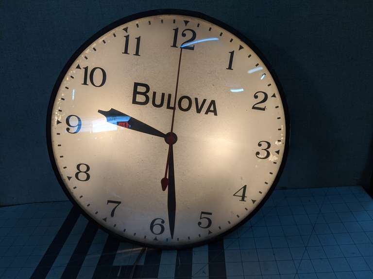 Bulova Wall Clock. Illuminated with Bubble Glass. Bid On Estates