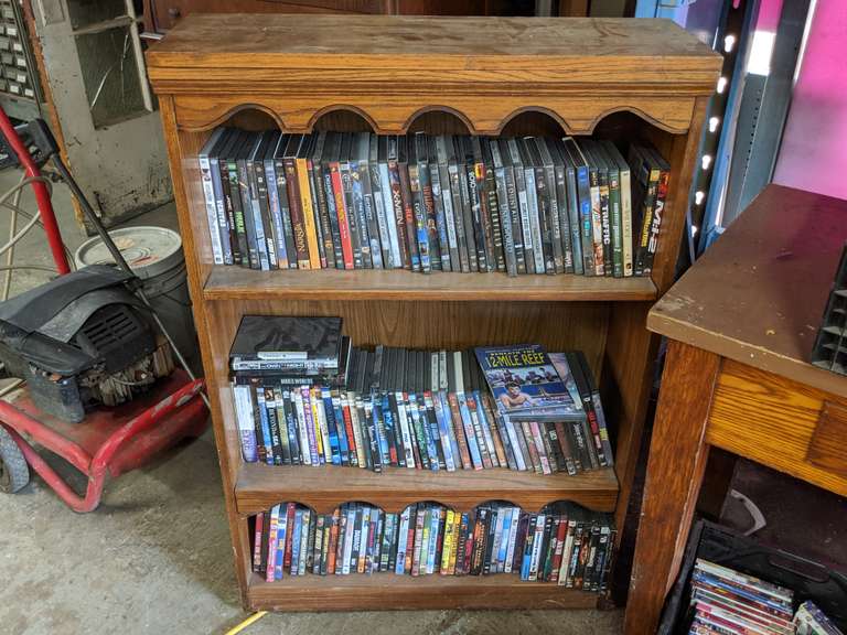 Bookcase. Includes DVDs Bid On Estates