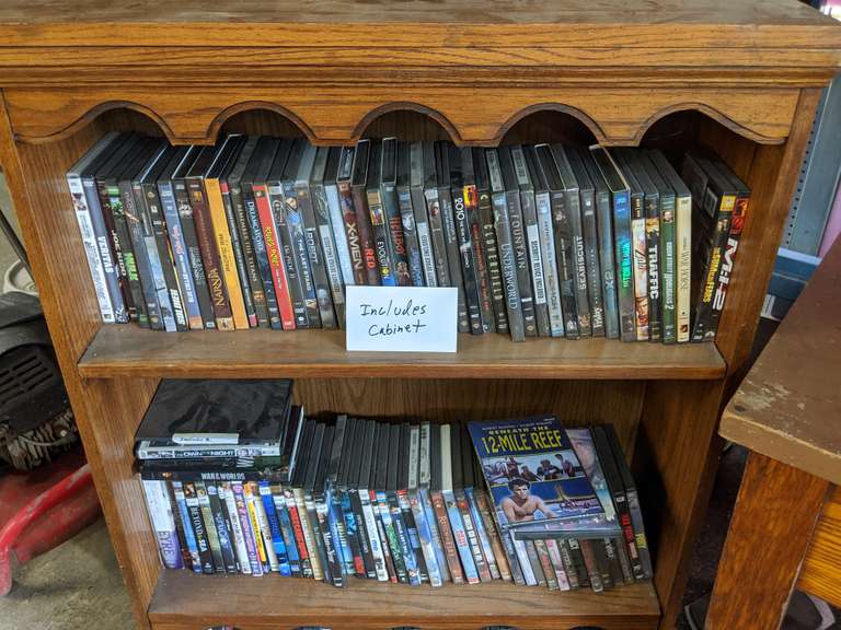 Bookcase. Includes DVDs Bid On Estates