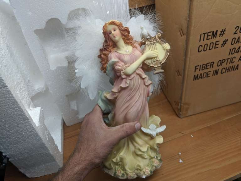 2 fiber optic angels Bid On Estates Auction Services