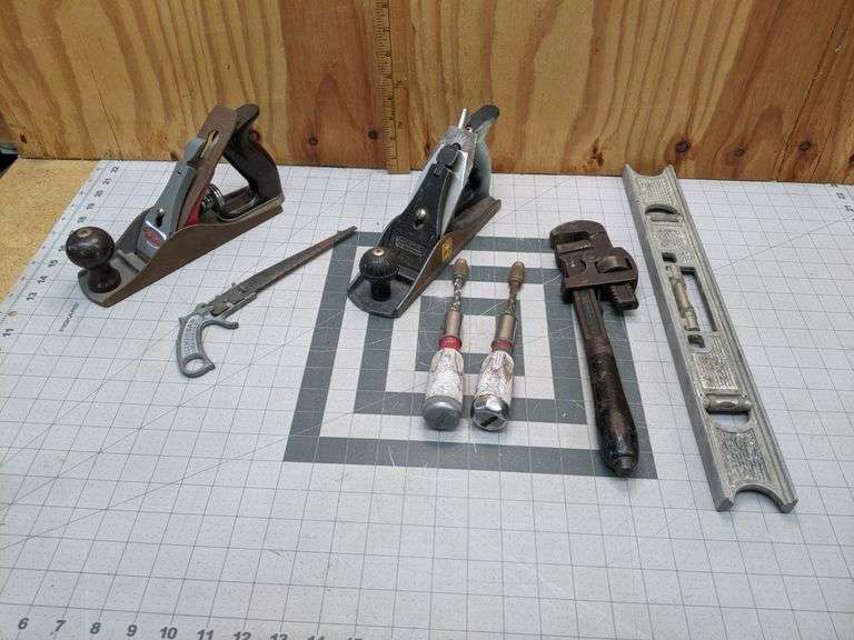 2 Hand Planes, Level, Screwdrivers, 14 Pipe Wrench Bid On Estates
