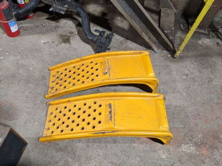 Pair of Yellow Car Ramps Bid On Estates Auction Services
