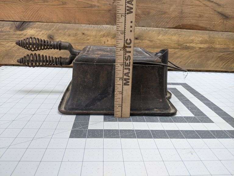 Cast Iron Waffle Iron by Fanner Mfg Co. Cleveland, OH Bid On Estates