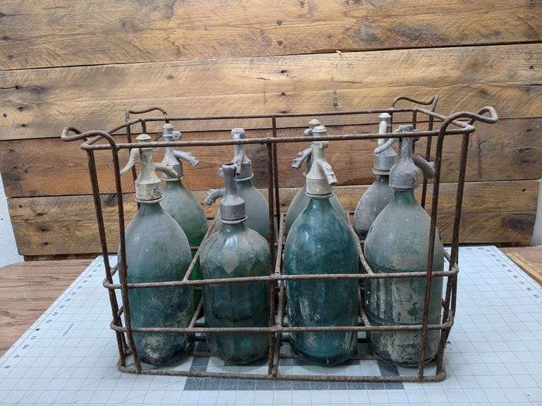 8 Antique Seltzer Bottles in Crate Bid On Estates Auction Services