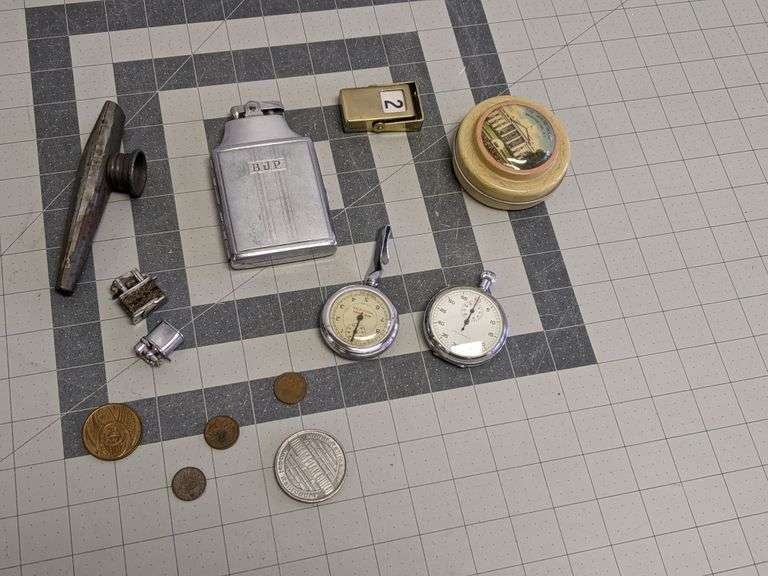 Stopwatch (possibly not working), Lighters, Flip Calendar Bid On