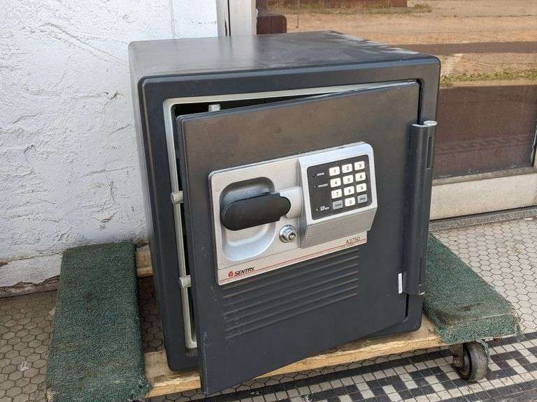 Sentry Safe (no combination or key, currently unlocked) Bid On