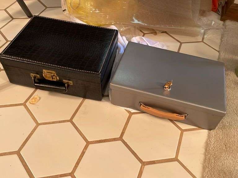 Fire safe box with key and small leather briefcase. ByceAUCTION LTD