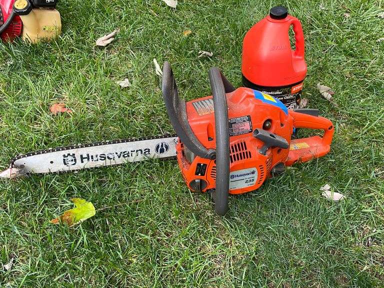 Husqvarna E series 235 chainsaw with stihl chain lubricant