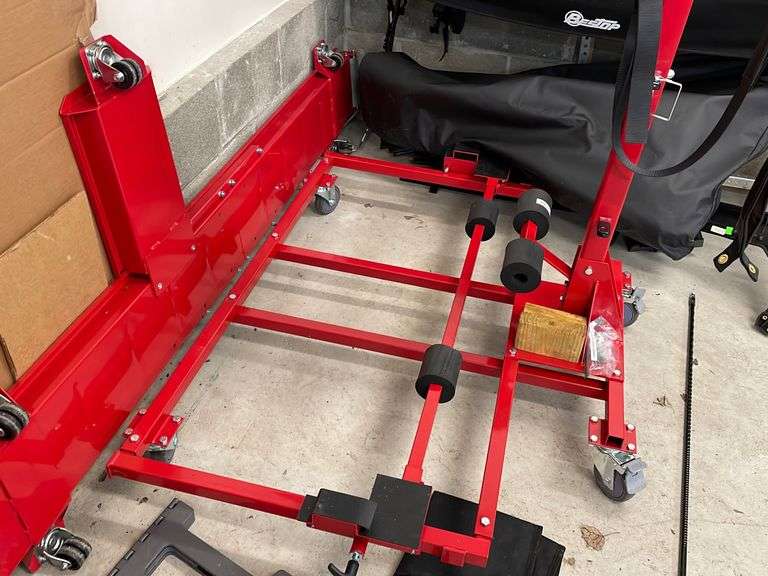 Back garage. Hoist a cart. GEN two. Hard and soft top hoist. The soft