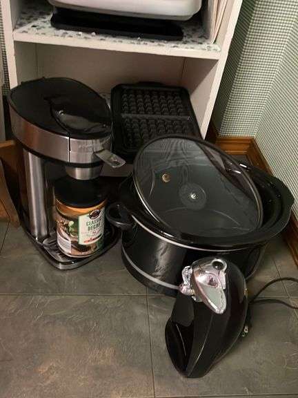 Large lot of electric kitchen appliances, crockpots miscellaneous includes shelf.