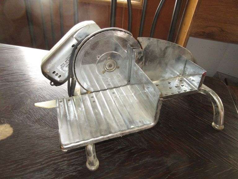 Rival Food Slicer, Manual Grinder Prime Time Auctions, Inc.