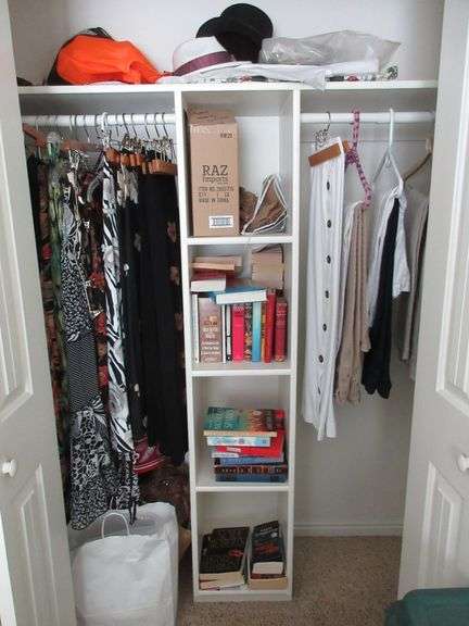 Contents of Closet: Skirts, Pants, Books, Hats, More