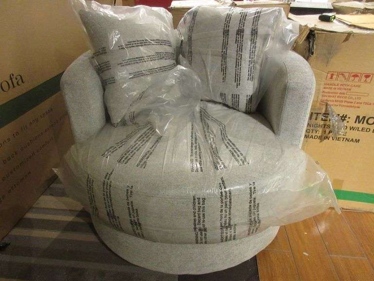 Cloth Cream Colored Swivel Chair Prime Time Auctions, Inc.