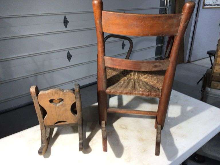 CHILD SIZE ROCKING CHAIR AND DOLL ROCKING CHAIR Currie Auction Service