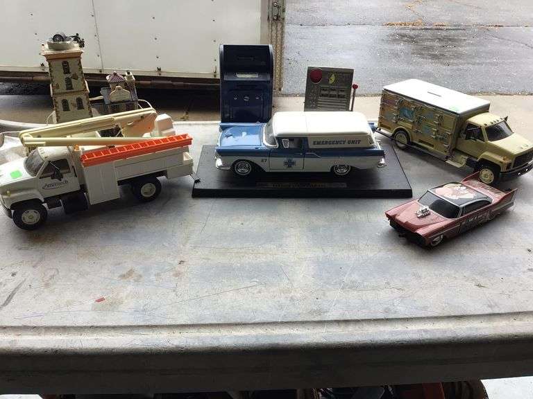 MODEL CARS AND BANKS Currie Auction Service