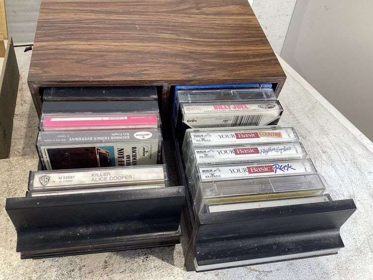VARIETY CASSETTE TAPES AND CASSETTE STORAGE BOXES Currie Auction Service