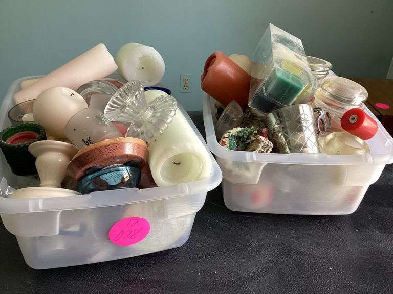 2 BINS OF ASSORTED CANDLES AND CANDLE HOLDERS Currie Auction Service