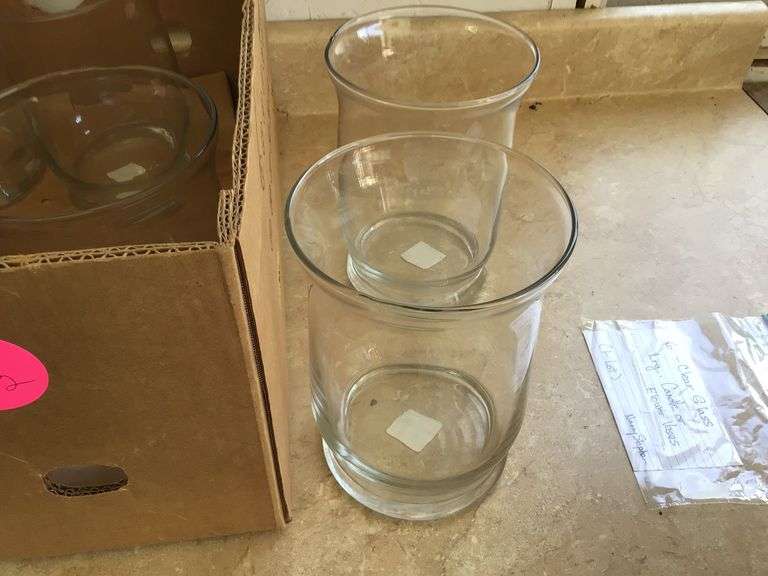 6 LARGE GLASS CANDLE HOLDERS/FLOWER VASES Currie Auction Service