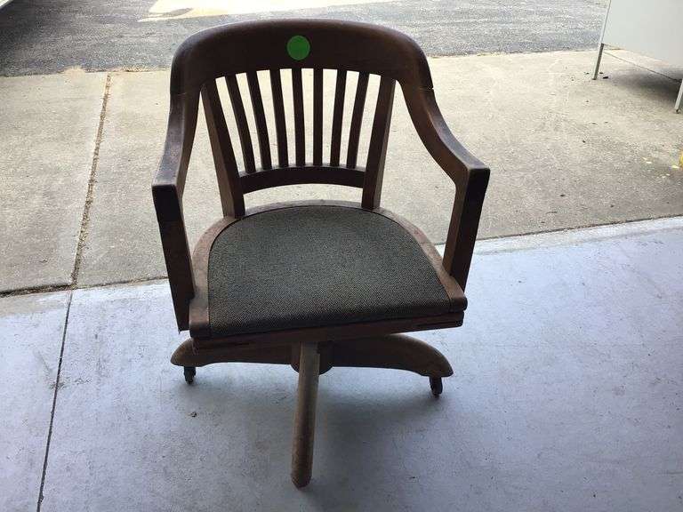 VINTAGE WOODEN OFFICE CHAIR ON WHEELS Currie Auction Service