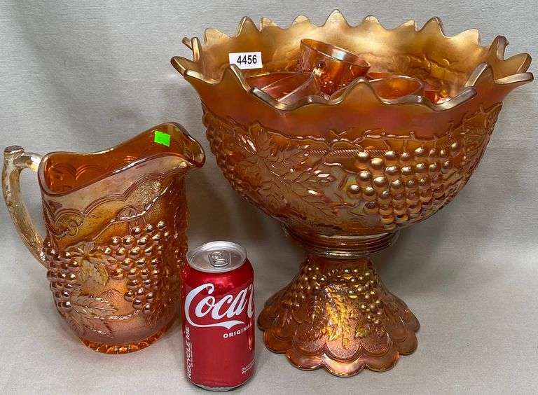 Marigold carnival glass punch bowl, cups, & pitcher Dixon's Auction