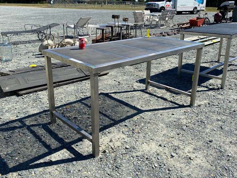Stainless metal table with reticulated top Dixon's Auction at Crumpton