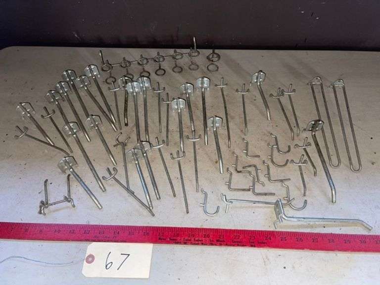 Peg board hooks • Garage Duck Soup Auctions