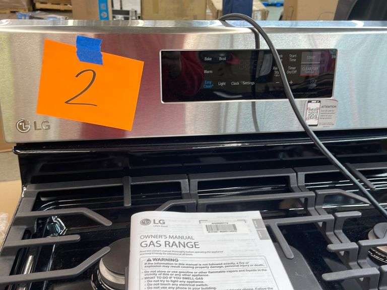 LG GAS RANGE (MODEL LRGL5821S) Earl's Auction Company