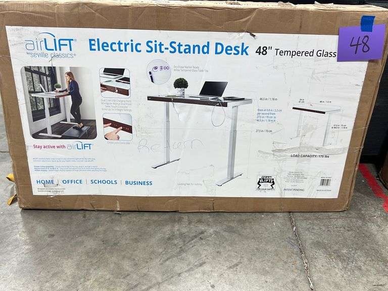 SEVILLE CLASSICS AIR LIFT SITSTAND DESK IN BOX Earl's Auction Company