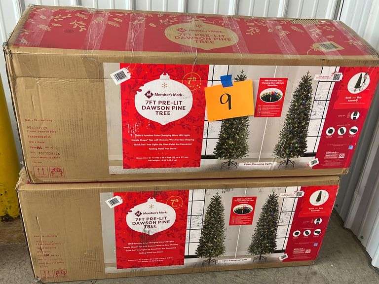 (2) 7FT PRE LIT TREES IN BOXES Earl's Auction Company