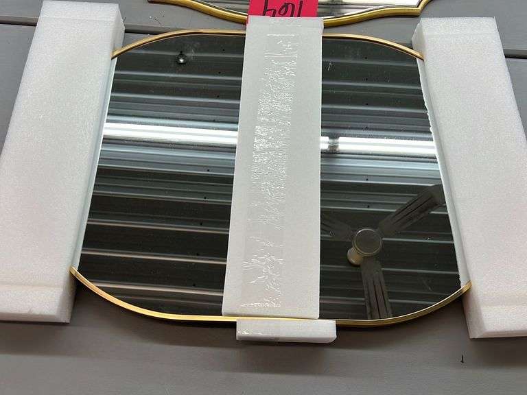 (2) ASSORTED GOLD WALL MIRRORS Earl's Auction Company